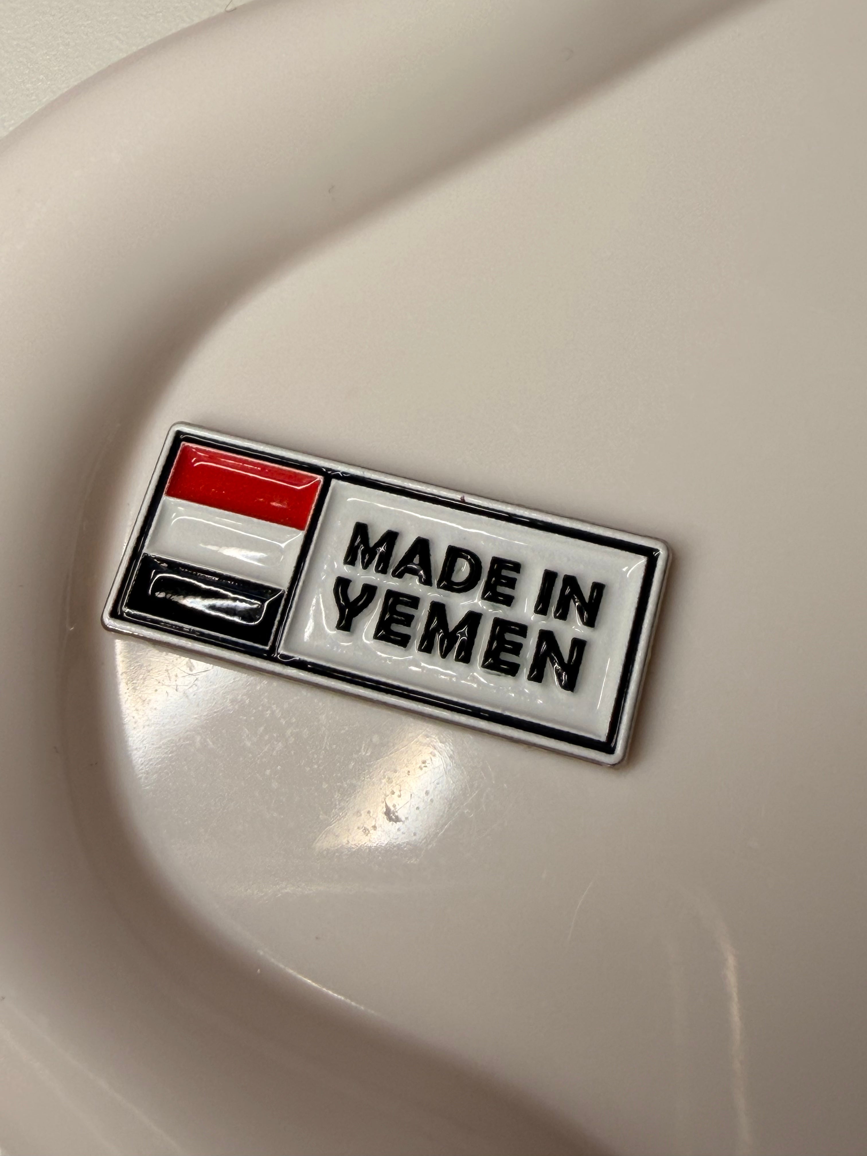 “Made in Yamen” metal sticker