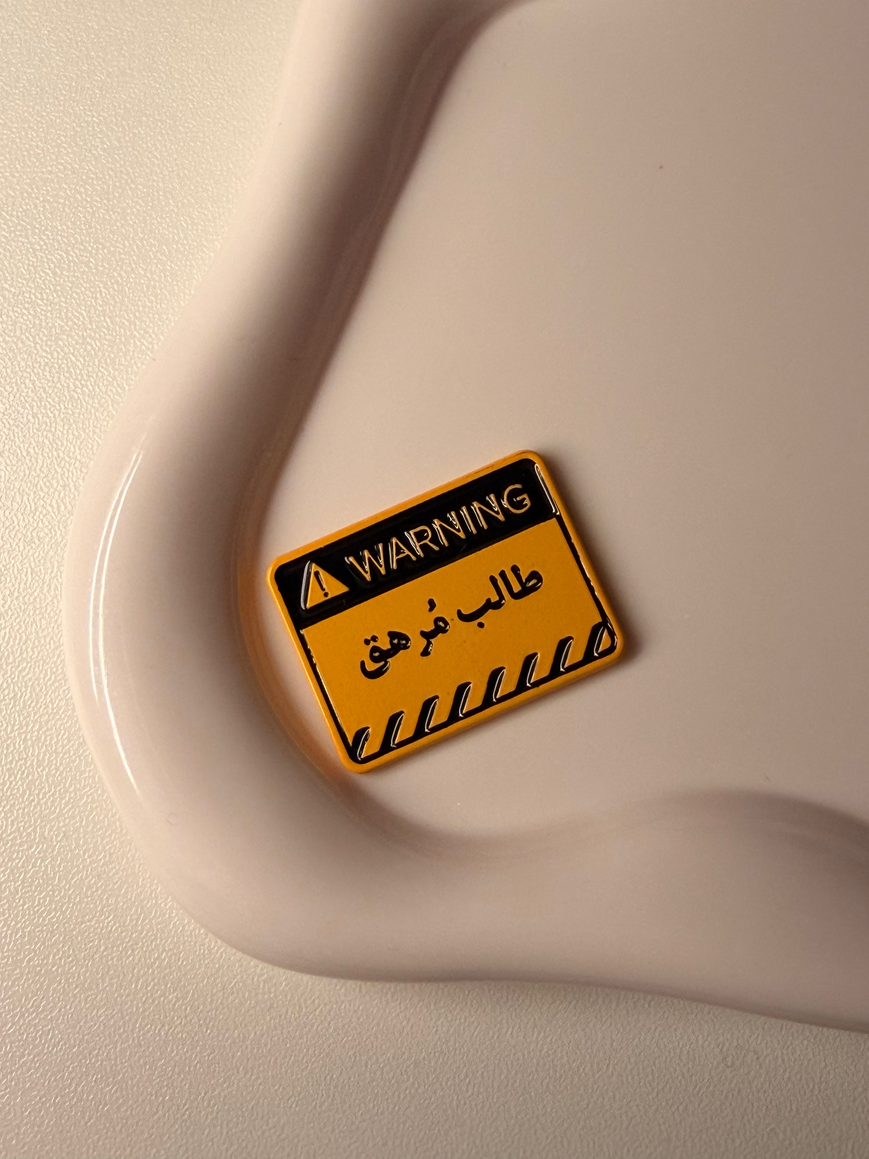 “Exhausted Student” metal sticker